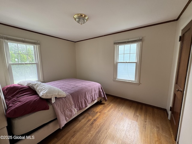 46 Elmhurst Ave, Albany, NY 12203 - bedroom with ornamental molding, wood finished floors, and baseboards
