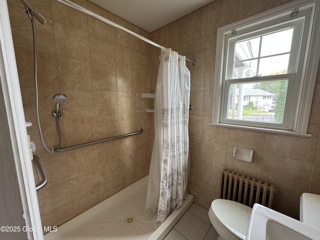 46 Elmhurst Ave, Albany, NY 12203 - full bath with radiator, toilet, a stall shower, tile patterned floors, and tile walls