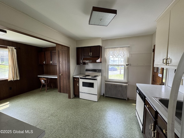 46 Elmhurst Ave, Albany, NY 12203 - kitchen with white appliances, radiator heating unit, under cabinet range hood, and healthy amount of natural light