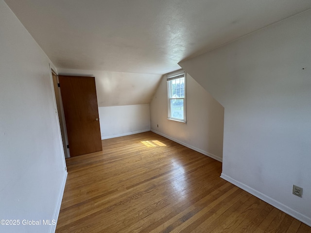 46 Elmhurst Ave, Albany, NY 12203 - bonus room featuring wood finished floors, baseboards, and vaulted ceiling