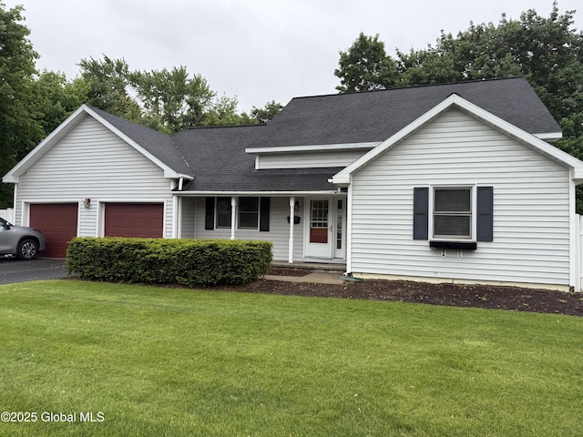12 Graves St, Glens Falls, NY 12801 - view of front facade with a garage, a front yard, roof with shingles, and asphalt driveway