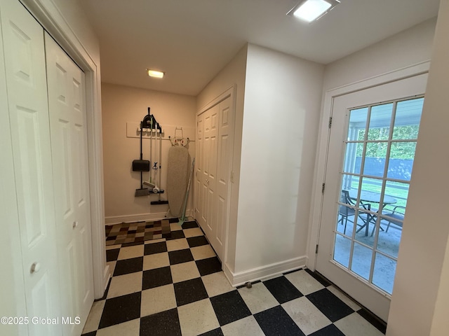 12 Graves St, Glens Falls, NY 12801 - corridor featuring tile patterned floors and baseboards