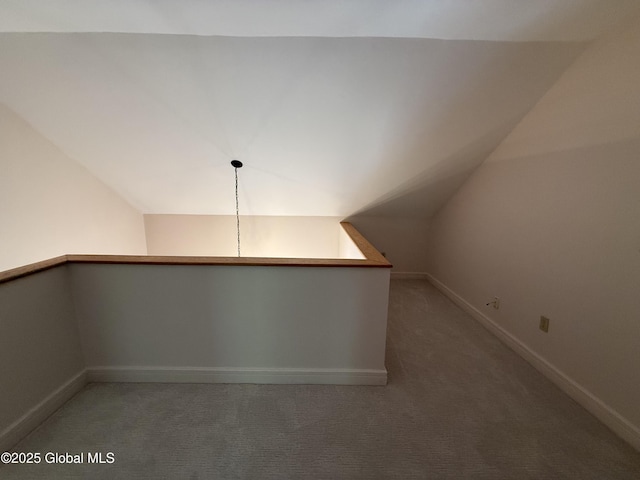 12 Graves St, Glens Falls, NY 12801 - bonus room with lofted ceiling, light colored carpet, and baseboards
