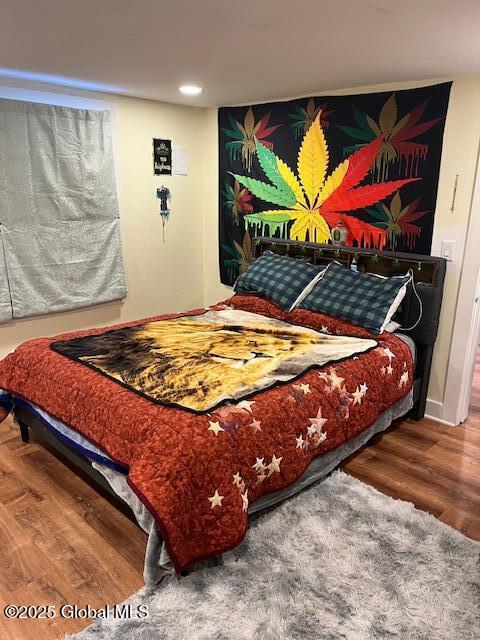 159 Champlain Ave, Ticonderoga, NY 12883 - bedroom featuring wood finished floors and recessed lighting