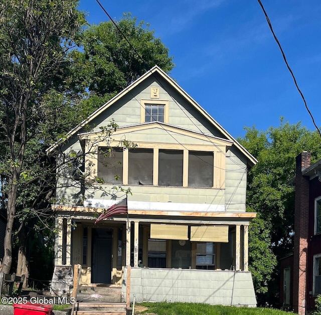 159 Champlain Ave, Ticonderoga, NY 12883 - view of front of house with covered porch