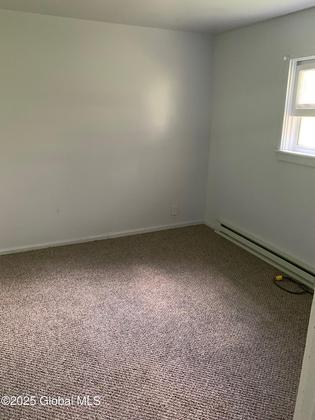 326 Middle Rd, Crown Point, NY 12928 - carpeted empty room featuring a baseboard radiator and baseboards