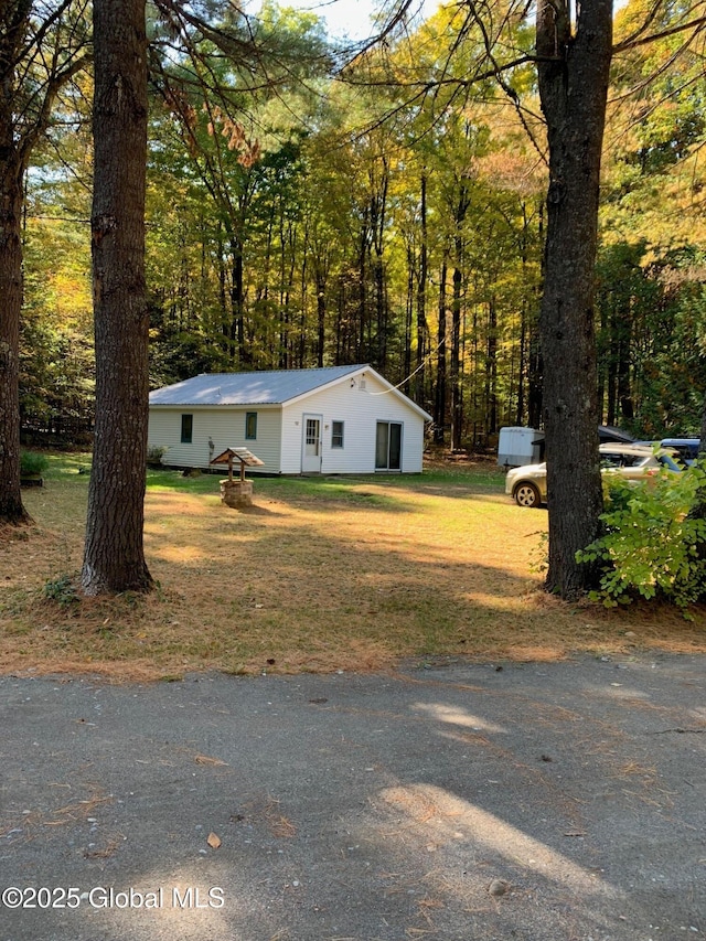 326 Middle Rd, Crown Point, NY 12928 - view of front of property with metal roof and a view of trees