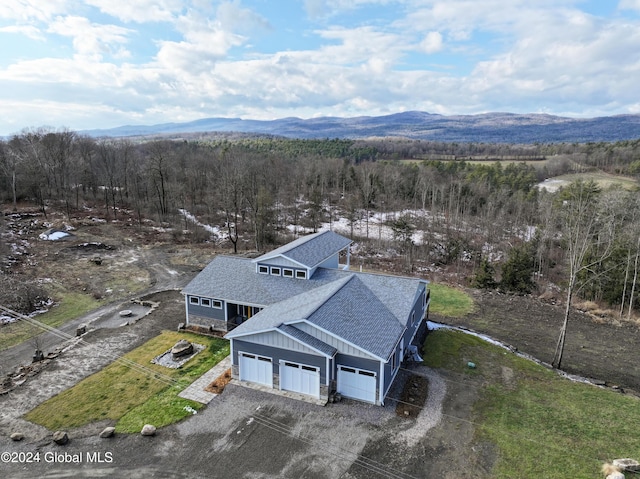 74 Dick Hyatt Ln, Whitehall, NY 12887 - aerial view of property and surrounding area featuring a heavily wooded area and mountains