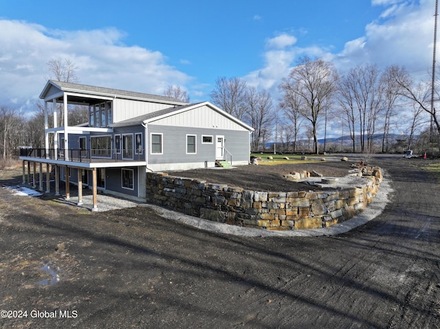 74 Dick Hyatt Ln, Whitehall, NY 12887 - view of side of property with a deck
