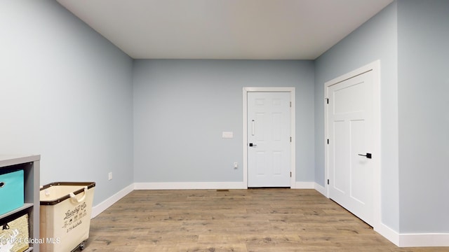 74 Dick Hyatt Ln, Whitehall, NY 12887 - spare room featuring light wood-style floors and baseboards