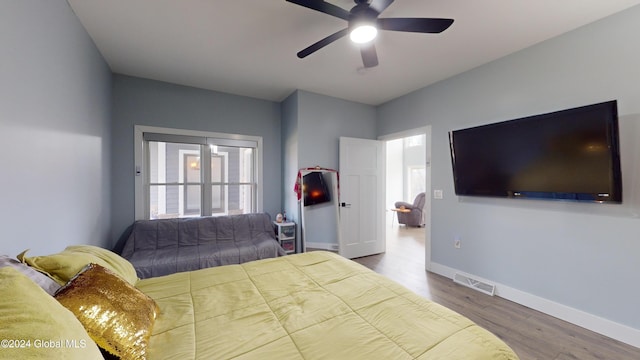 74 Dick Hyatt Ln, Whitehall, NY 12887 - bedroom featuring wood finished floors, baseboards, and ceiling fan
