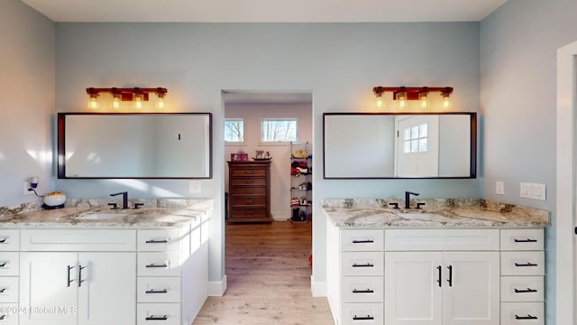 74 Dick Hyatt Ln, Whitehall, NY 12887 - full bath featuring wood finished floors and two vanities