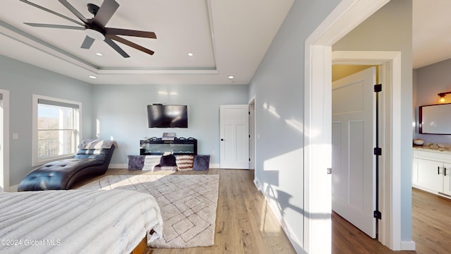 74 Dick Hyatt Ln, Whitehall, NY 12887 - bedroom with a tray ceiling, light wood finished floors, recessed lighting, and baseboards