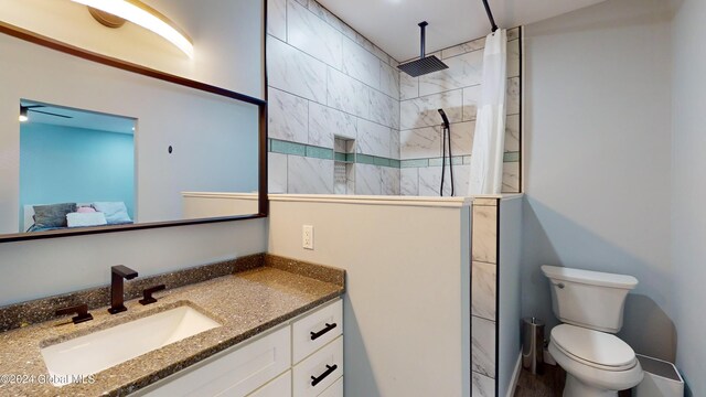 74 Dick Hyatt Ln, Whitehall, NY 12887 - full bathroom with vanity, tiled shower, and toilet