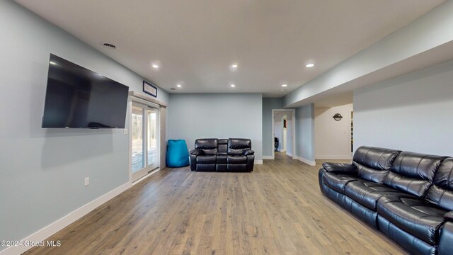 74 Dick Hyatt Ln, Whitehall, NY 12887 - living area featuring recessed lighting, wood finished floors, and baseboards