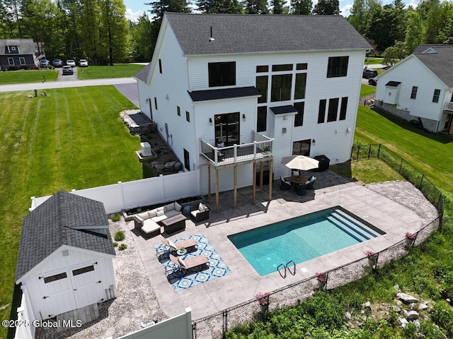 22 Burnham Rd, Wilton, NY 12831 - rear view of property featuring a shingled roof, an outdoor living space, and a patio