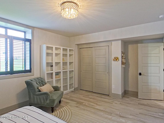 22 Burnham Rd, Wilton, NY 12831 - sitting room featuring a chandelier, light wood-type flooring, healthy amount of natural light, and baseboards