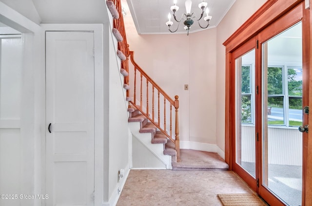 44 Hudson Ave, Bethlehem, NY 12054 - foyer entrance featuring a chandelier, baseboards, stairs, and crown molding