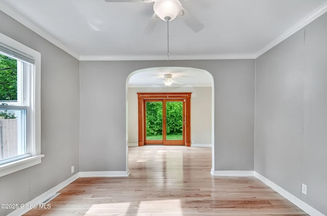 44 Hudson Ave, Bethlehem, NY 12054 - unfurnished room featuring arched walkways, ceiling fan, healthy amount of natural light, and crown molding