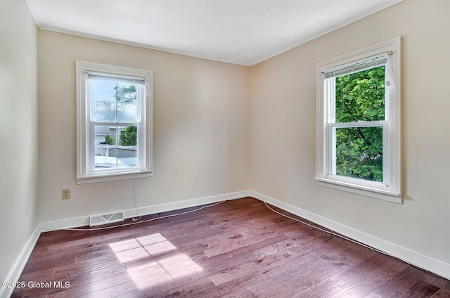 44 Hudson Ave, Bethlehem, NY 12054 - unfurnished room with healthy amount of natural light, wood finished floors, and ornamental molding