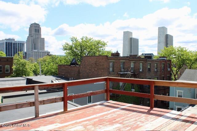 7 Garden Aly, Albany, NY 12210 - wooden terrace with a skyline view