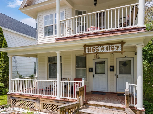 1165 Glenwood Blvd, Schenectady, NY 12308 - view of exterior entry featuring a balcony and covered porch