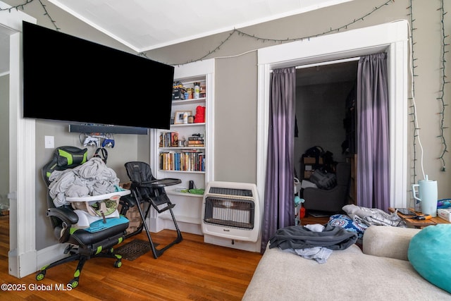 1165 Glenwood Blvd, Schenectady, NY 12308 - bedroom featuring heating unit, wood finished floors, and lofted ceiling