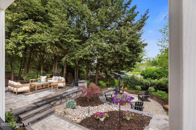 1335 Stanley Ln, Niskayuna, NY 12309 - fenced backyard with a patio and outdoor lounge area