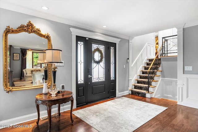1335 Stanley Ln, Niskayuna, NY 12309 - entrance foyer with stairs, wood finished floors, crown molding, and recessed lighting