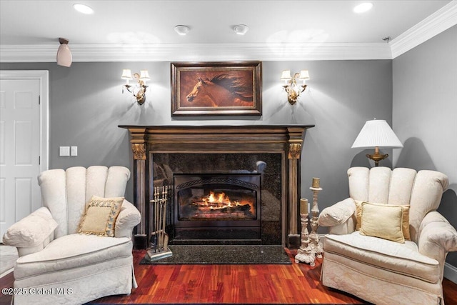 1335 Stanley Ln, Niskayuna, NY 12309 - sitting room with wood finished floors, ornamental molding, a high end fireplace, and recessed lighting