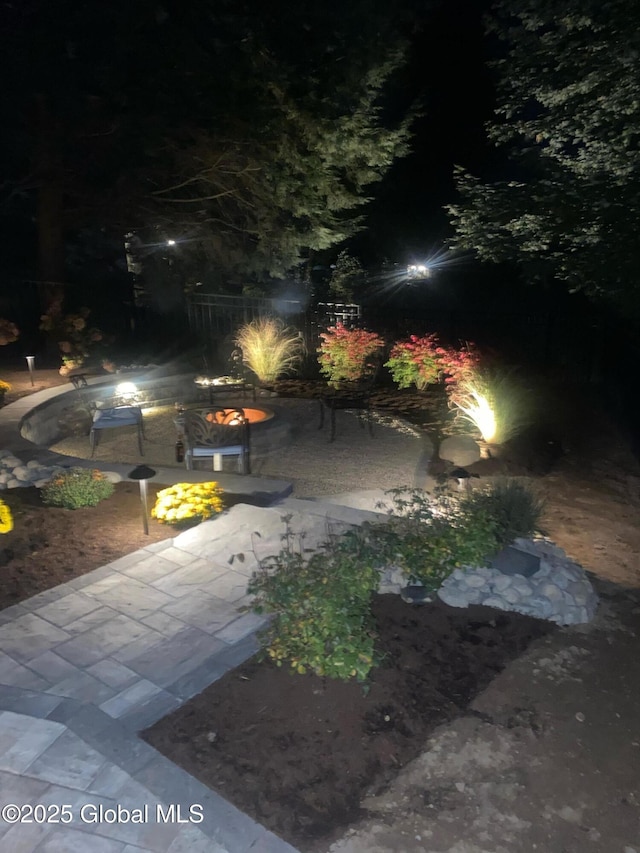 1335 Stanley Ln, Niskayuna, NY 12309 - yard at twilight featuring a patio area