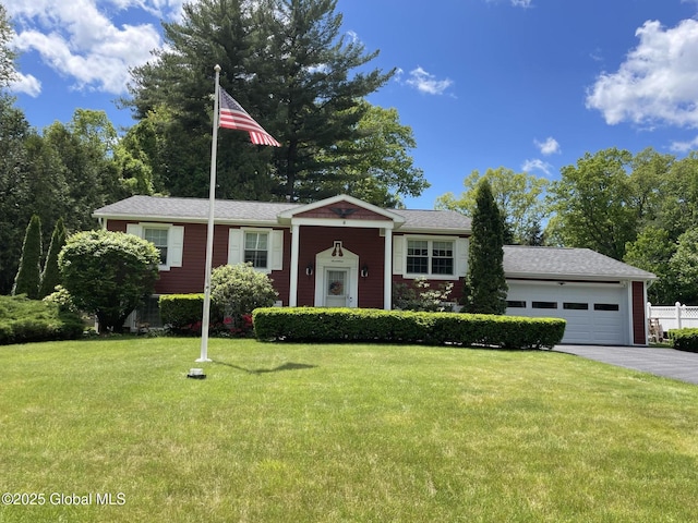 17 Sylvan Ln, Clifton Park, NY 12065 - split foyer home featuring a garage, a front lawn, and driveway
