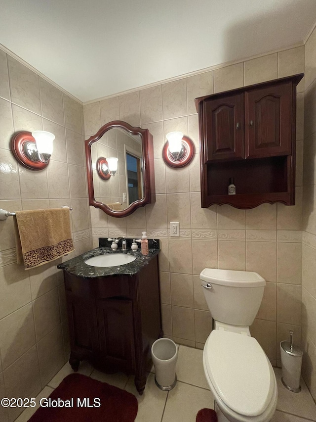 17 Sylvan Ln, Clifton Park, NY 12065 - bathroom featuring tile walls, vanity, tile patterned flooring, and toilet