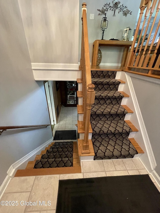 17 Sylvan Ln, Clifton Park, NY 12065 - stairs with baseboards and tile patterned flooring