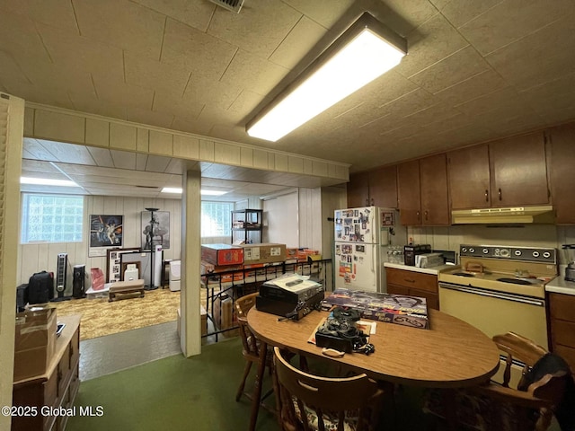 17 Sylvan Ln, Clifton Park, NY 12065 - kitchen featuring white appliances, under cabinet range hood, and light countertops