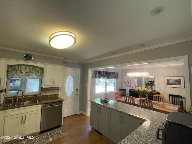 17 Sylvan Ln, Clifton Park, NY 12065 - kitchen with stainless steel dishwasher, a sink, crown molding, white cabinetry, and dark wood-style floors