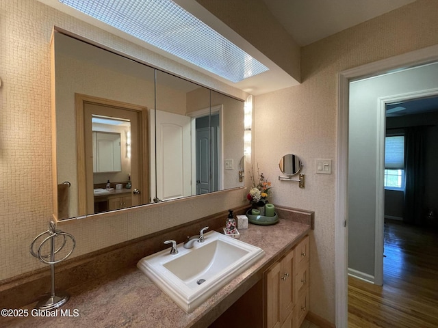 17 Sylvan Ln, Clifton Park, NY 12065 - bathroom featuring vanity and wood finished floors