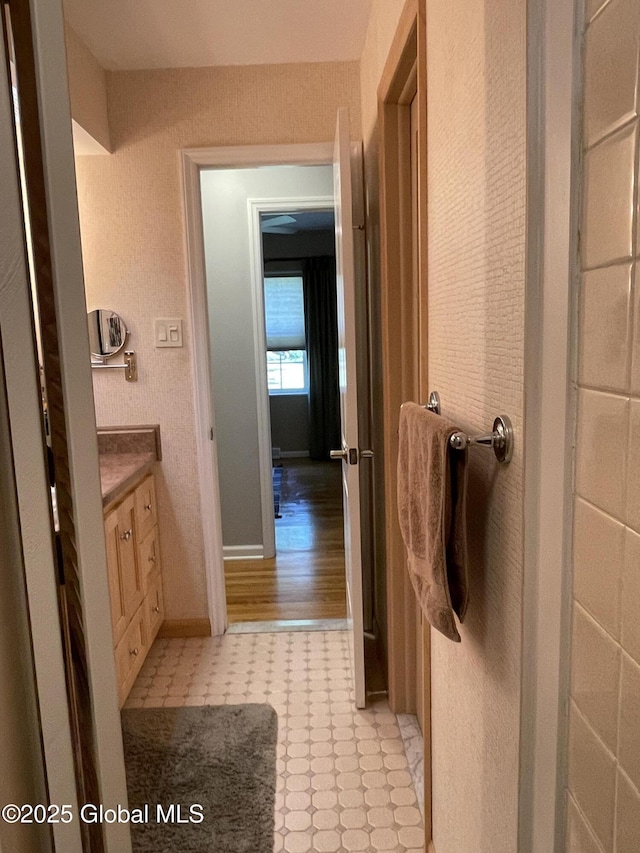 17 Sylvan Ln, Clifton Park, NY 12065 - bathroom with vanity, tile patterned floors, and baseboards