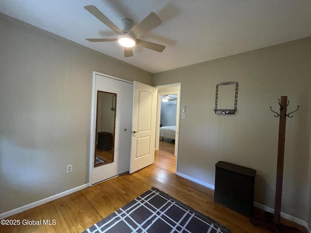 17 Sylvan Ln, Clifton Park, NY 12065 - unfurnished bedroom featuring wood finished floors, baseboards, and a ceiling fan