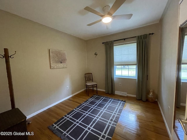 17 Sylvan Ln, Clifton Park, NY 12065 - unfurnished bedroom featuring wood finished floors, baseboards, and a ceiling fan