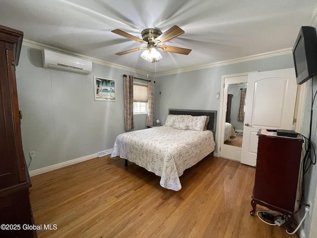 17 Sylvan Ln, Clifton Park, NY 12065 - bedroom featuring a wall mounted air conditioner, light wood finished floors, ornamental molding, baseboards, and ceiling fan