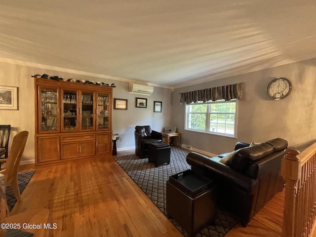 17 Sylvan Ln, Clifton Park, NY 12065 - living area with a wall mounted AC, wood finished floors, ornamental molding, and baseboards