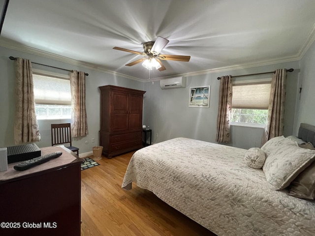 17 Sylvan Ln, Clifton Park, NY 12065 - bedroom with a wall mounted air conditioner, light wood-style floors, crown molding, ceiling fan, and baseboards