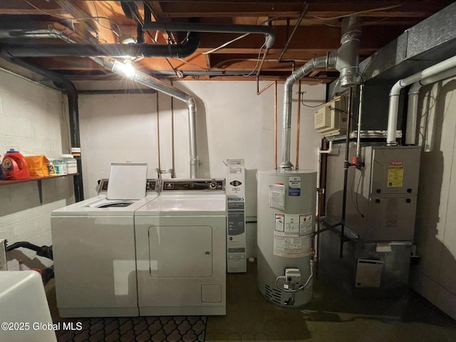 17 Sylvan Ln, Clifton Park, NY 12065 - laundry room featuring independent washer and dryer, gas water heater, and concrete block wall