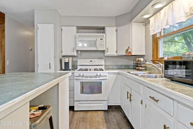 13 Willow Ln, Halfmoon, NY 12118 - kitchen featuring white appliances, tile counters, white cabinetry, and dark wood-type flooring