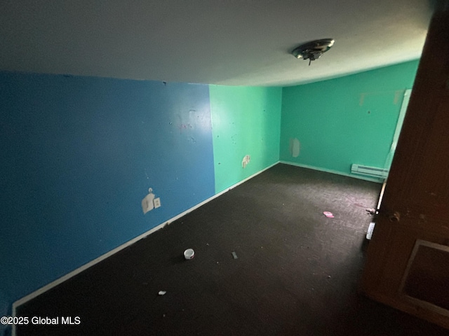 207 Fon Clair St, Johnstown, NY 12095 - carpeted spare room with a baseboard heating unit and baseboards