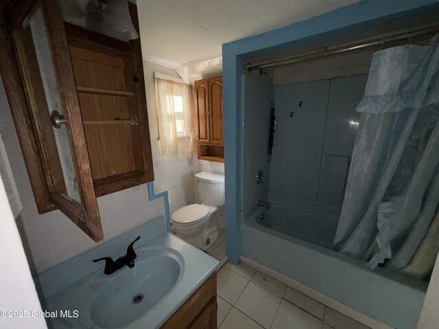 207 Fon Clair St, Johnstown, NY 12095 - full bathroom with shower / tub combo, vanity, and tile patterned flooring