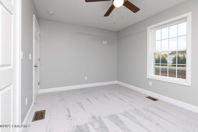 30 W St, Hudson Falls, NY 12839 - carpeted spare room with a ceiling fan, baseboards, and a smoke detector