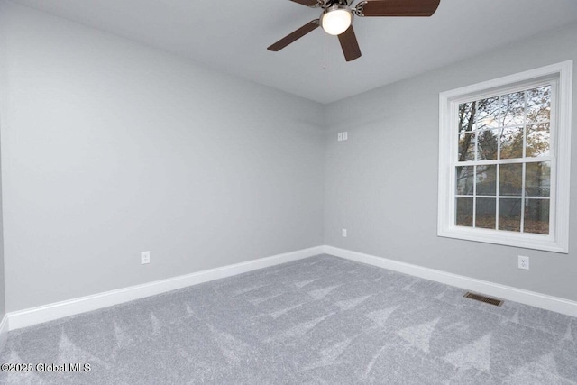 30 W St, Hudson Falls, NY 12839 - carpeted empty room with baseboards and ceiling fan