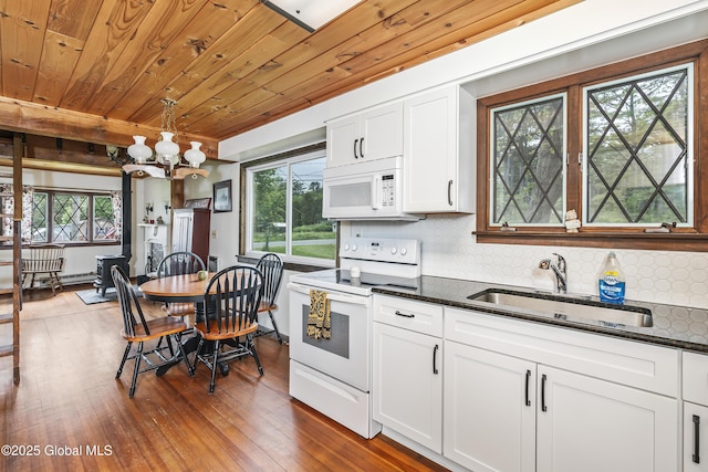 5882 Lake Rd, Galway, NY 12074 - kitchen with white appliances, a sink, wooden ceiling, a chandelier, and dark wood-type flooring